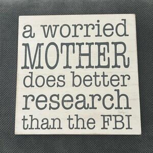 Cute worried mother sign